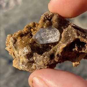 Herkimer diamond on a bed of druzy